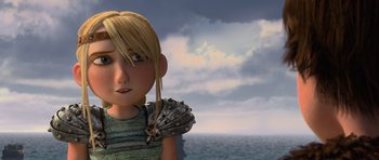 Movie still from “How to Train Your Dragon” (2010), directed by Chris Sanders – A girl with blond hair is looking into the distance; Close Up shot, Low angle