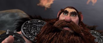 Movie still from “How to Train Your Dragon” (2010), directed by Chris Sanders – A character with a beard; Close Up shot, Low angle