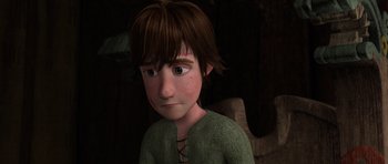 Movie still from “How to Train Your Dragon” (2010), directed by Chris Sanders – A boy with brown hair and green eyes; Close Up shot, Low angle