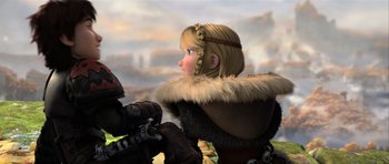 Movie still from “How to Train Your Dragon 2” (2014), directed by Dean DeBlois – A woman in a fur coat looking off into the distance; Medium shot, Over the shoulder angle