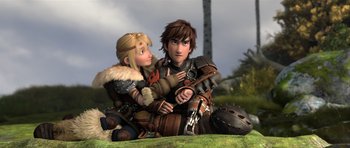 Movie still from “How to Train Your Dragon 2” (2014), directed by Dean DeBlois – A couple of people sitting on the grass; Medium shot, Low angle