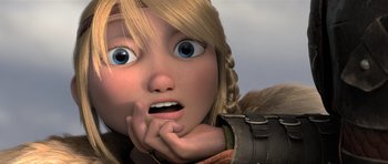 Movie still from “How to Train Your Dragon 2” (2014), directed by Dean DeBlois – A person with her hand to her face; Close Up shot, Low angle