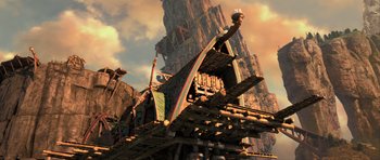 Movie still from “How to Train Your Dragon 2” (2014), directed by Dean DeBlois – An image of a building that is made of wood; Extreme Wide shot, Low angle