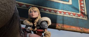 Movie still from “How to Train Your Dragon 2” (2014), directed by Dean DeBlois – A woman in a fur trimmed outfit; Medium shot, Low angle