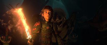 Movie still from “How to Train Your Dragon 2” (2014), directed by Dean DeBlois – A young boy standing in front of an evil dragon; Medium shot, High angle