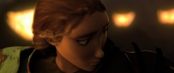 Movie still from “How to Train Your Dragon 2” (2014), directed by Dean DeBlois – A woman's face in a dimly - lit room; Close Up shot, Over the shoulder angle