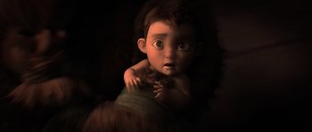 Movie still from “How to Train Your Dragon 2” (2014), directed by Dean DeBlois – An animated baby holding a stuffed animal in a dark room; Medium shot, High angle