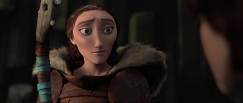 Movie still from “How to Train Your Dragon 2” (2014), directed by Dean DeBlois – A woman in a brown jacket is looking at the camera; Close Up shot, Over the shoulder angle