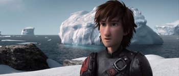 Movie still from “How to Train Your Dragon 2” (2014), directed by Dean DeBlois – A person near a body of water; Medium shot, High angle