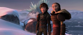 Movie still from “How to Train Your Dragon 2” (2014), directed by Dean DeBlois – A couple of people standing next to each other in the snow; Medium shot, Low angle