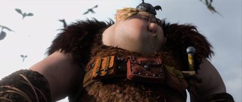 Movie still from “How to Train Your Dragon 2” (2014), directed by Dean DeBlois – A cartoon character with a bird flying in the background; Medium shot, Low angle