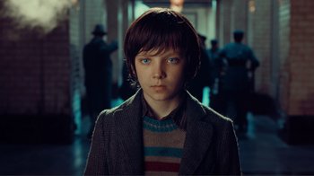 Movie still from “Hugo” (2011), directed by Martin Scorsese – Close Up shot, Over the shoulder angle