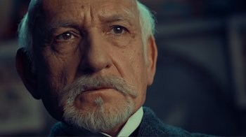 Movie still from “Hugo” (2011), directed by Martin Scorsese – Close Up shot, Over the shoulder angle