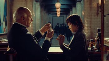 Movie still from “Hugo” (2011), directed by Martin Scorsese – Medium shot, Over the shoulder angle