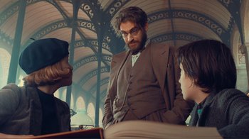 Movie still from “Hugo” (2011), directed by Martin Scorsese – Medium shot, Over the shoulder angle