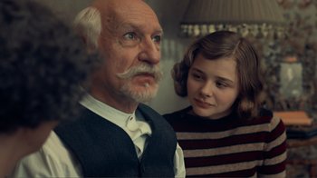 Movie still from “Hugo” (2011), directed by Martin Scorsese – Close Up shot, Over the shoulder angle