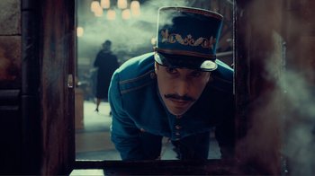 Movie still from “Hugo” (2011), directed by Martin Scorsese – Medium shot, Low angle