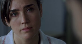 Movie still from “Hulk” (2003), directed by Ang Lee – A woman's face in a white shirt; Close Up shot, Over the shoulder angle