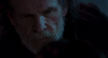 Movie still from “Hulk” (2003), directed by Ang Lee – An old man with a beard is looking at the camera; Close Up shot, Low angle