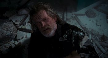 Movie still from “Hulk” (2003), directed by Ang Lee – An old man with a beard and a black shirt; Close Up shot, Overhead angle