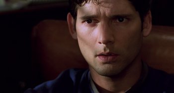Movie still from “Hulk” (2003), directed by Ang Lee – A man's face in a dark room; Close Up shot, Low angle