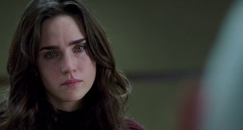 Movie still from “Hulk” (2003), directed by Ang Lee – A person with long brown hair; Close Up shot, Over the shoulder angle