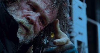 Movie still from “Hulk” (2003), directed by Ang Lee – A man's face and hand; Close Up shot, Over the shoulder angle