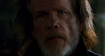 Movie still from “Hulk” (2003), directed by Ang Lee – A person with a beard; Close Up shot, Over the shoulder angle