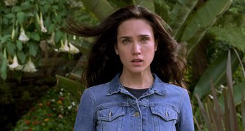 Movie still from “Hulk” (2003), directed by Ang Lee – A beautiful young woman with long , brown hair; Close Up shot, Over the shoulder angle