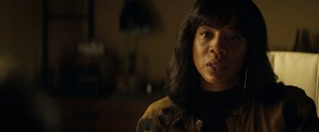 Movie still from “Hypnotic” (2023), directed by Robert Rodriguez – A person with long black hair; Close Up shot, Over the shoulder angle