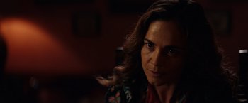 Movie still from “Hypnotic” (2023), directed by Robert Rodriguez – A person with long hair; Close Up shot, Over the shoulder angle