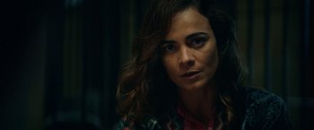 Movie still from “Hypnotic” (2023), directed by Robert Rodriguez – A person with long brown hair; Close Up shot, Over the shoulder angle