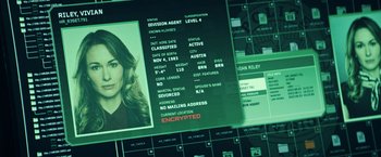 Movie still from “Hypnotic” (2023), directed by Robert Rodriguez – A computer screen showing a person's name and address; Extreme Close Up shot, Overhead angle