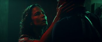 Movie still from “Hypnotic” (2023), directed by Robert Rodriguez – A man and a woman in a dark room; Close Up shot, Low angle