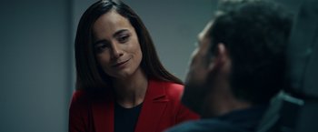 Movie still from “Hypnotic” (2023), directed by Robert Rodriguez – A woman wearing a red jacket talking to a man; Close Up shot, Over the shoulder angle
