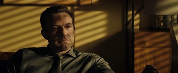 Movie still from “Hypnotic” (2023), directed by Robert Rodriguez – A person wearing a shirt and a tie; Close Up shot, Over the shoulder angle