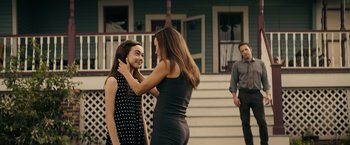 Movie still from “Hypnotic” (2023), directed by Robert Rodriguez – A woman and a young girl standing next to each other; Medium shot, Over the shoulder angle