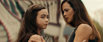 Movie still from “Hypnotic” (2023), directed by Robert Rodriguez – A woman and a young girl looking at each other; Close Up shot, Over the shoulder angle