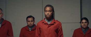 Movie still from “Hypnotic” (2023), directed by Robert Rodriguez – A man and a woman standing next to each other; Medium shot, Low angle