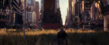 Movie still from “I Am Legend” (2007), directed by Francis Lawrence – A man standing in the middle of a field in the middle of a city; Extreme Wide shot, High angle
