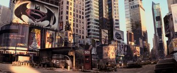 Movie still from “I Am Legend” (2007), directed by Francis Lawrence – A view of a city with a lot of billboards on the side; Extreme Wide shot, High angle