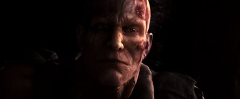 Movie still from “I Am Legend” (2007), directed by Francis Lawrence – A man's face in the dark; Extreme Close Up shot, Low angle