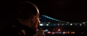 Movie still from “I Am Legend” (2007), directed by Francis Lawrence – A person with a beard; Close Up shot, Over the shoulder angle