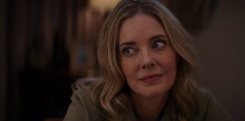 Movie still from “I Believe in Santa” (2022), directed by Alex Ranarivelo – A person with long blonde hair; Close Up shot, Over the shoulder angle