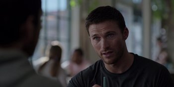 Movie still from “I Want You Back” (2022), directed by Jason Orley – A person holding a pen; Close Up shot, Over the shoulder angle