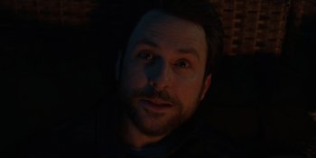 Movie still from “I Want You Back” (2022), directed by Jason Orley – A person looking at the camera; Close Up shot, High angle