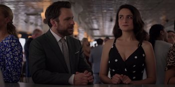 Movie still from “I Want You Back” (2022), directed by Jason Orley – A man and a woman sitting at a counter; Close Up shot, Over the shoulder angle