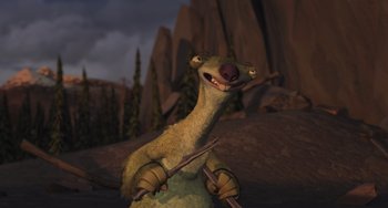 Movie still from “Ice Age” (2002), directed by Chris Wedge – An ice age character is standing in front of some rocks; Medium shot, Low angle