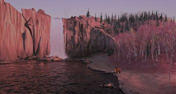 Movie still from “Ice Age” (2002), directed by Chris Wedge – A large waterfall is shown near a body of water; Extreme Wide shot, High angle