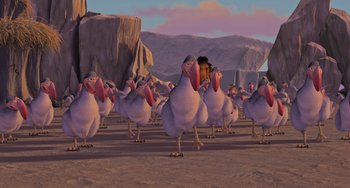 Movie still from “Ice Age” (2002), directed by Chris Wedge – A bunch of birds are standing in the desert; Extreme Wide shot, High angle